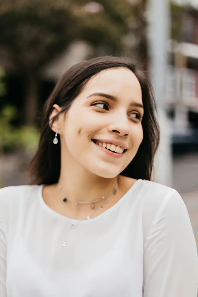 Woman showing off her new dimples in Honolulu after getting dimpleplasty at Hawaii Facial Plastic Surgery on Oahu. 