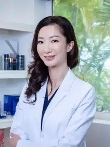 Headshot of Hawaii female plastic surgeon, Dr. Susan Tan. She specializes deep plane neck lift procedures on Oahu that offer natural-looking results.